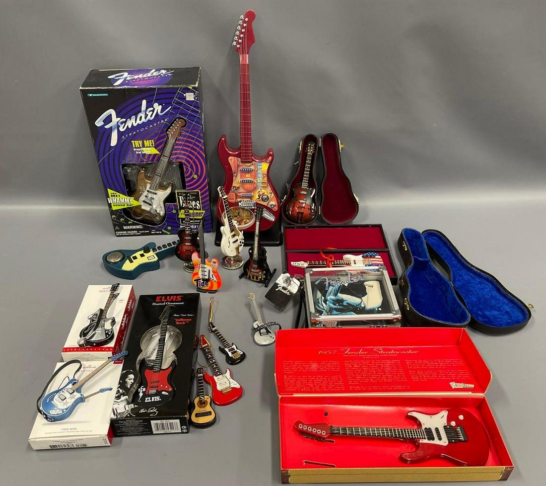 Eighteen miniature guitars in different scales (1 of 5)