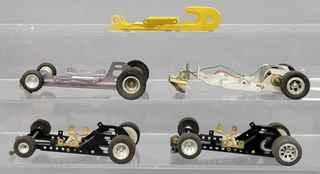 Five 1/24 scale slot car chassis only (1 of 4)