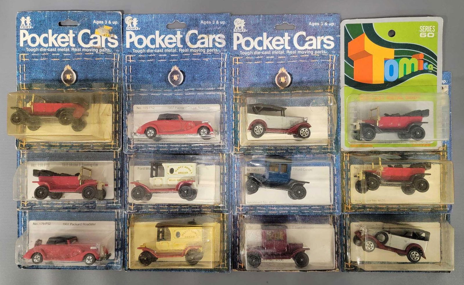 Twelve Tomy Pocket vintage cars on original cards (1 of 3)