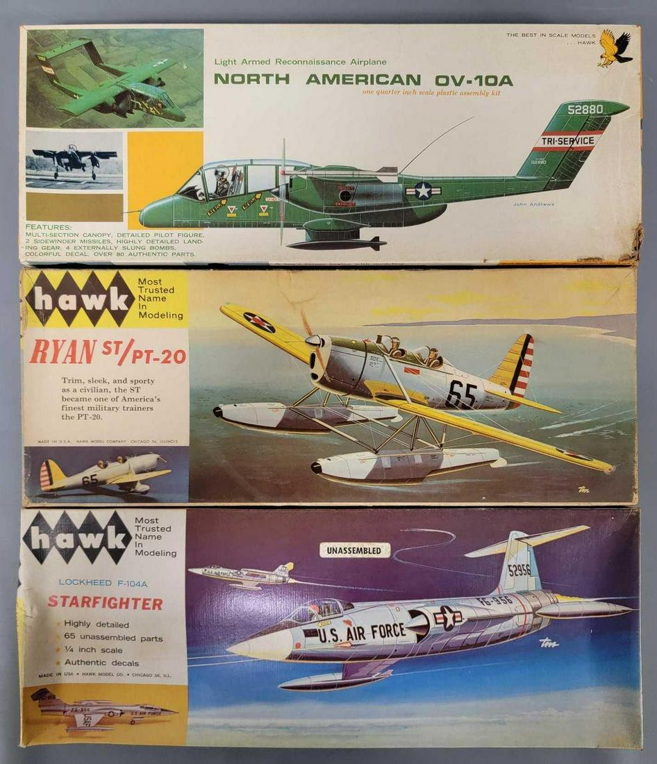 Three Hawk 1/48 scale model plane kits in original boxes: Three Hawk 1/48 scale model plane kits in original boxes, includes 561-130 North American OV-10A, 504 Lockheed F-104A Starfighter and 510-130 Ryan st/pt-20, all appear complete with instructions and d