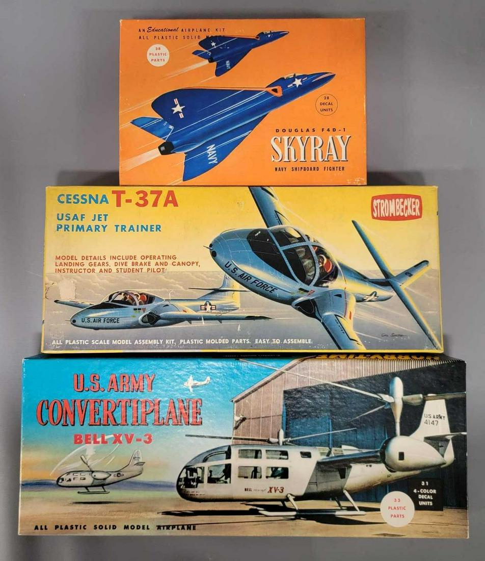 Three mixed maker and scale military jet model kits in original boxes: Three mixed maker and scale military jet model kits in original boxes, includes Strombecker D33 Cessna T-37A USAF Jet primary trainer, Hobby-time 1102 Douglas Skyray F4D-1 and Hobby-time 901 US Army C