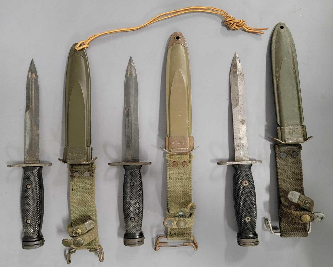 Three Vietnam era bayonets M8 & M8A1: Three Vietnam era bayonets M8 & M8A, all are in good condition with typical wear , all have two piece screw on plastic grips, one sheath is labeled US M8, the other two are labeled US M8A1.