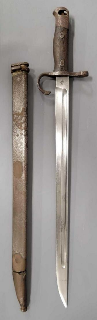 Japanese World War II Arisaka Bayonet fighting knife: Japanese World War II Arisaka Bayonet fighting knife, blade has been sharpened but not much, hilt has rusted, would definitely clean up well if desired, original scabbard is rusty as well, it looks to