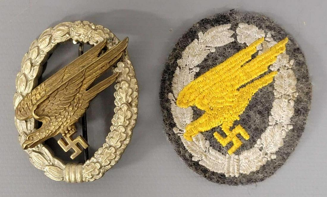 German World War II Luftwaffe Paratrooper badge and patch: German World War II Luftwaffe Paratrooper badge and patch, badge is marked JMME & SOHN Berlin and is in to very good excellent condition as is the patch.It has been brought to my attention that the pa