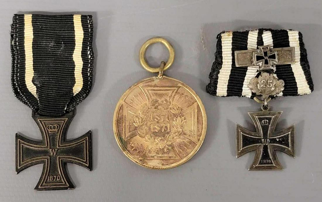 Three German Pre World War I medals: Three German / Prussia Pre World War I medals, includes an Iron Cross 1st class medal parade mounted with 25 year jubilee badge, a small 1st class iron cross medal with ribbon and an 1870-71 Prussian 