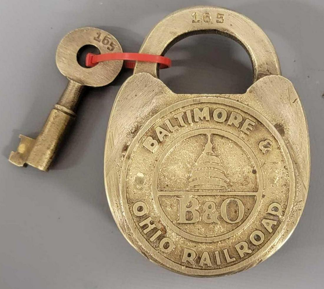 Fantasy Baltimore & Ohio B&O Railroad brass lock: Fantasy Baltimore & Ohio B&O Railroad brass lock, this is a fantasy / fake piece with matching key, both lock and key are in excellent working condition, both are stamped 165. This would never have be