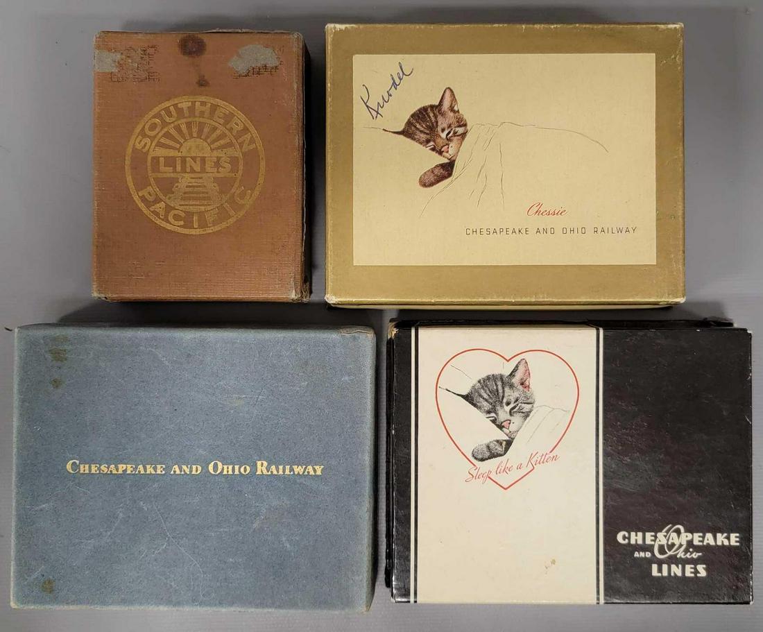 Four Railroad themed playing card sets: Four Railroad themed playing card sets, includes three Chessie double deck sets, gold box has writing on it but sets are sealed in cello inside, blue velvet set has one deck still sealed with wax pape