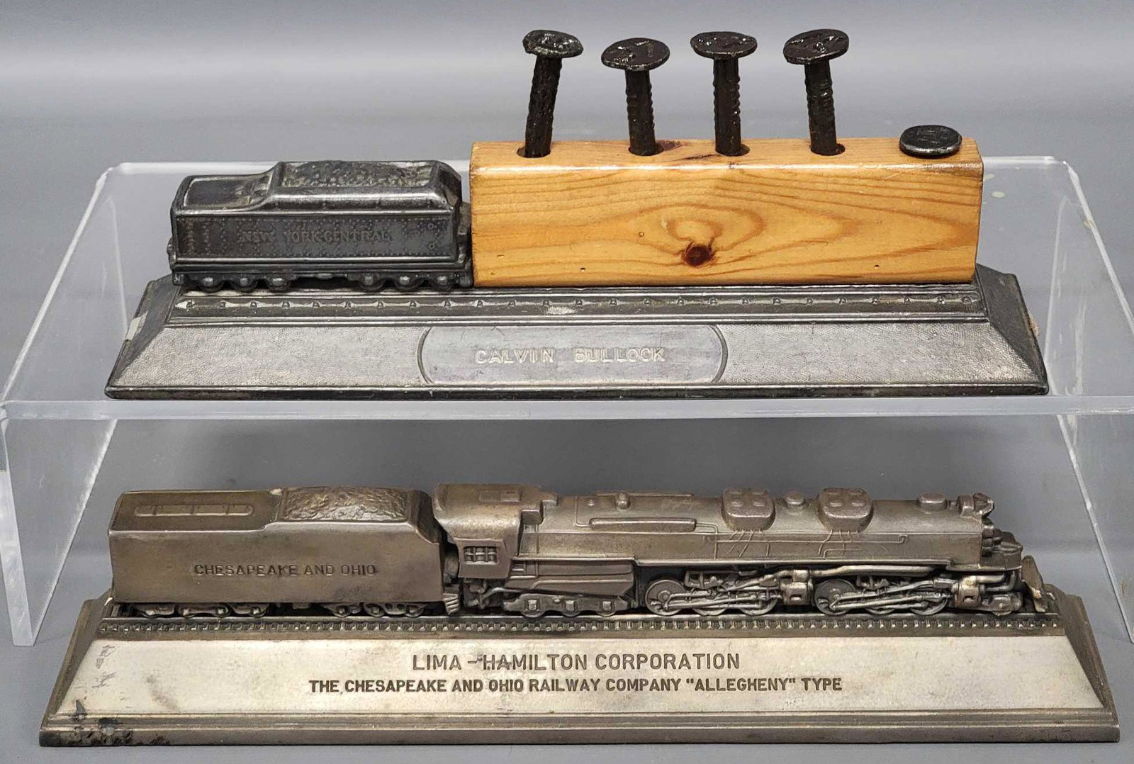 Two large Locomotive Desk top paperweights: Two large Locomotive Desk top paperweights, includes Lima Hamilton Corporation The Chesapeake & Ohio Railway Company Allegheny Type brass with felt covered base, this is 10 1/2 inches long and 2 1