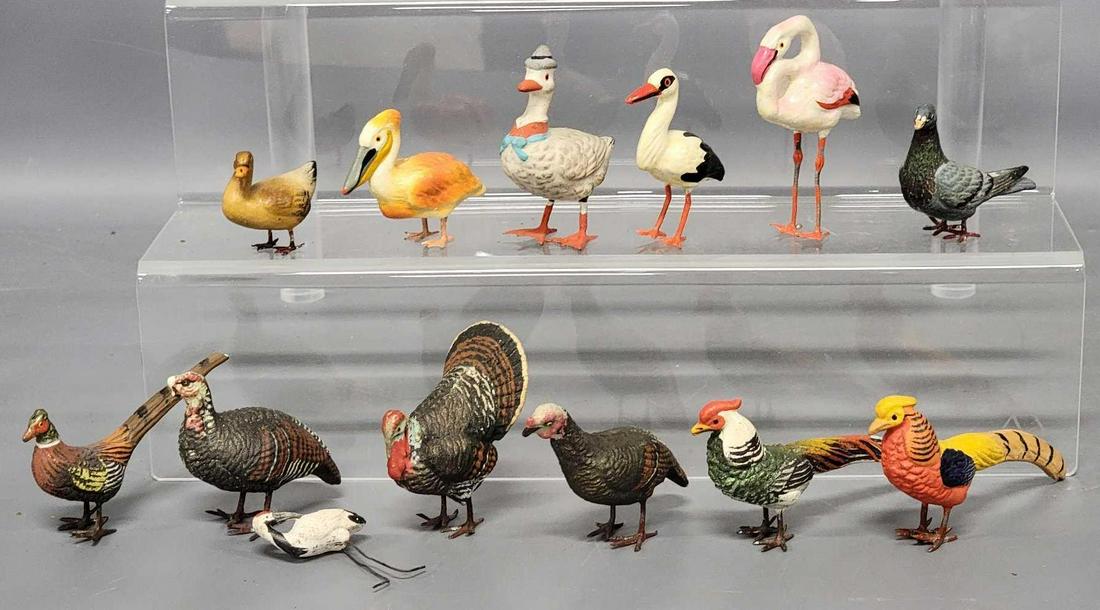 Thirteen assorted antique German Christmas Putz birds: Thirteen assorted antique German Christmas Putz birds, the Tom turkey is missing his lower wings, one of the turkey hens is missing her beak, otherwise these are in very good condition.