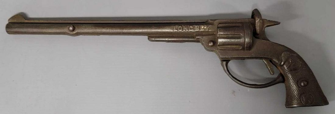 Vintage Kilgore cast iron Longboy cap gun: Vintage Kilgore cast iron Longboy cap gun. This "LONGBOY" cap gun was made in 1922. It is described in Sam Logan/Charles Best book "Cast Iron Toy Guns and Cap Shooters" on page 89 This