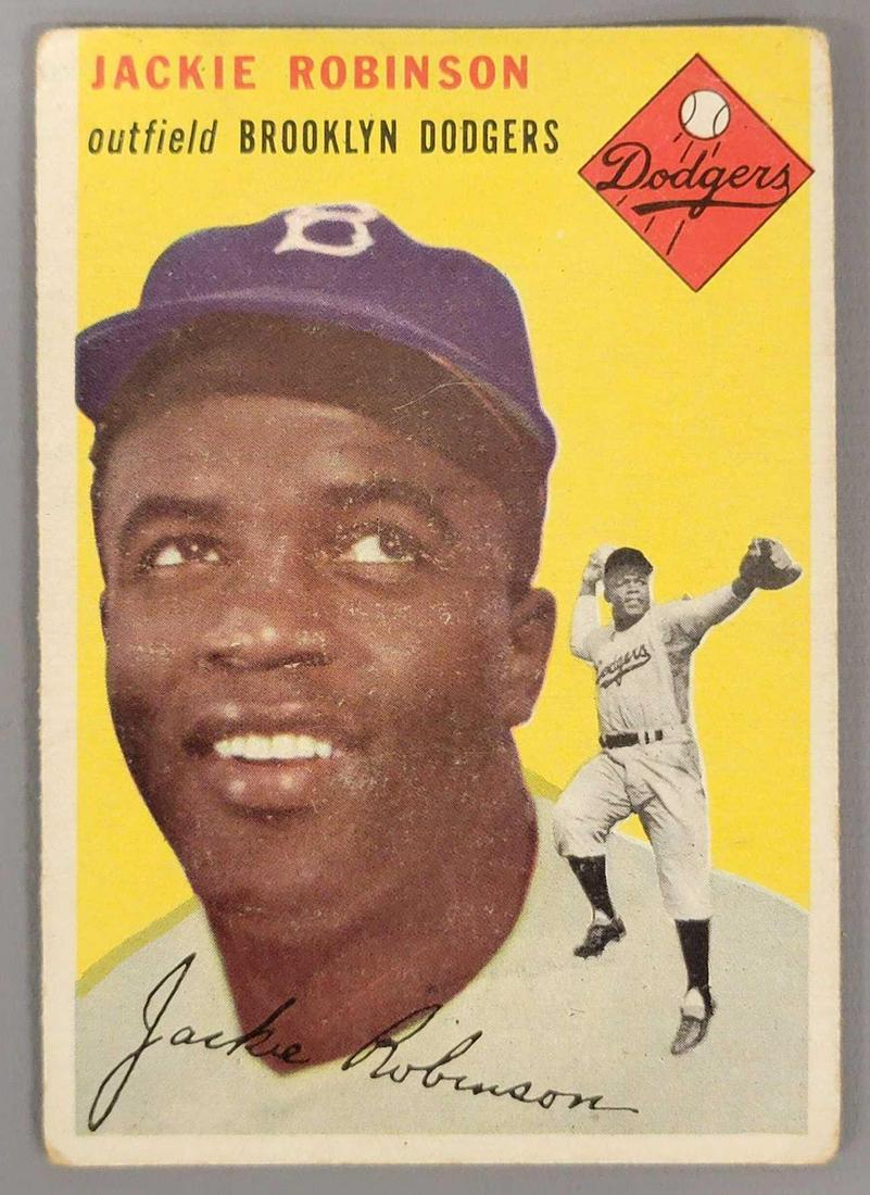 1954 Topps Jackie Robinson baseball card #10: 1954 Topps Jackie Robinson baseball card #10, card is good with great color, it has dinged corners with the upper right having a crease as well, no other creases.