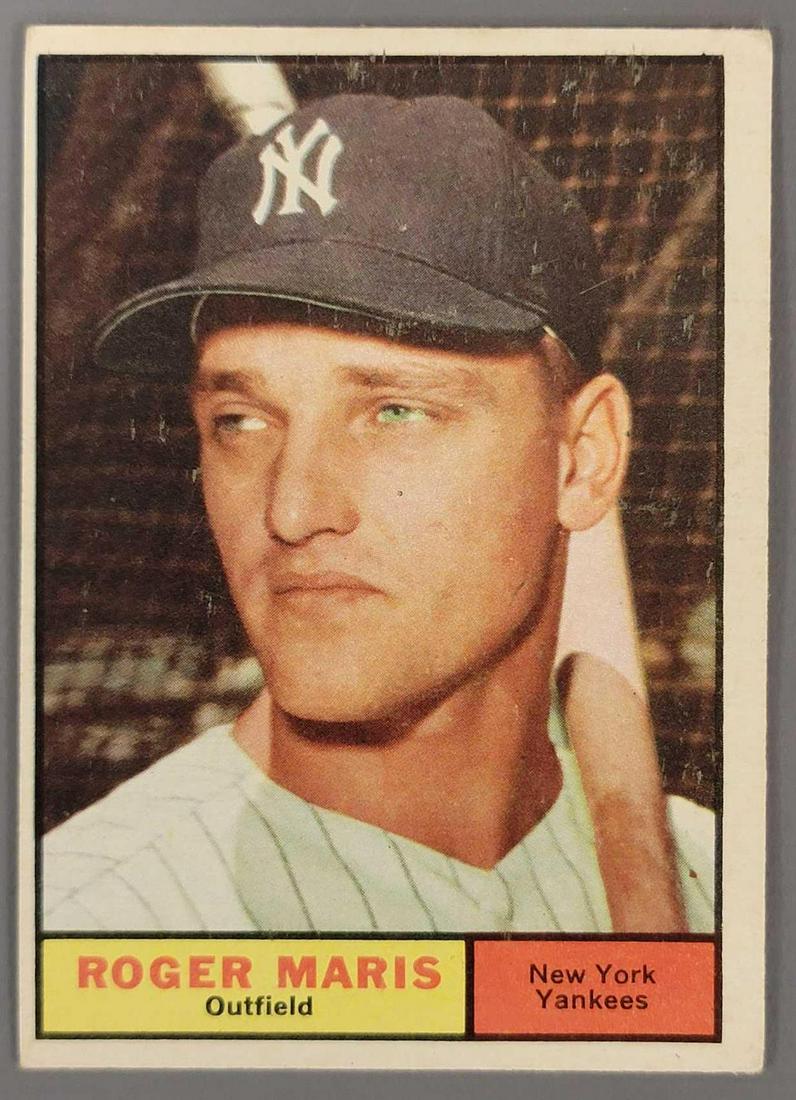 1961 Topps Roger Maris baseball card #2: 1961 Topps Roger Maris baseball card #2, car is good with great color with light corner dings, it is off center 90/10 right to left.