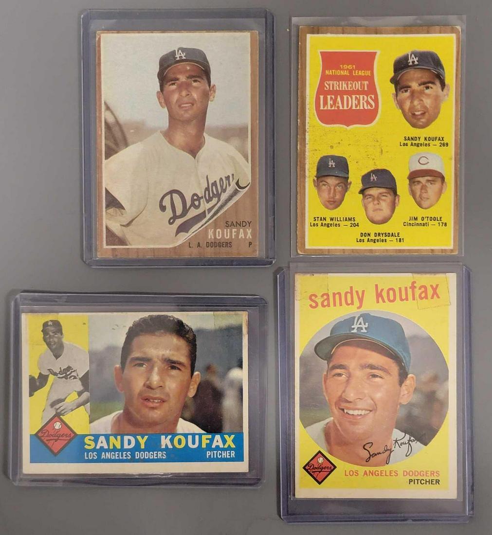 Four assorted year Topps Sandy Koufax baseball cards (1 of 6)