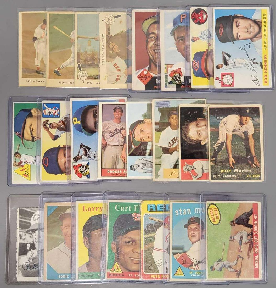 Twenty-three assorted year Topps baseball cards with many stars: Twenty-three assorted year Topps baseball cards with many stars, includes 1957 #62 Billy Martin that is poor to fair with edge and corner wear and creases, five 1955 Tops including Hal Newhouser, Bob 