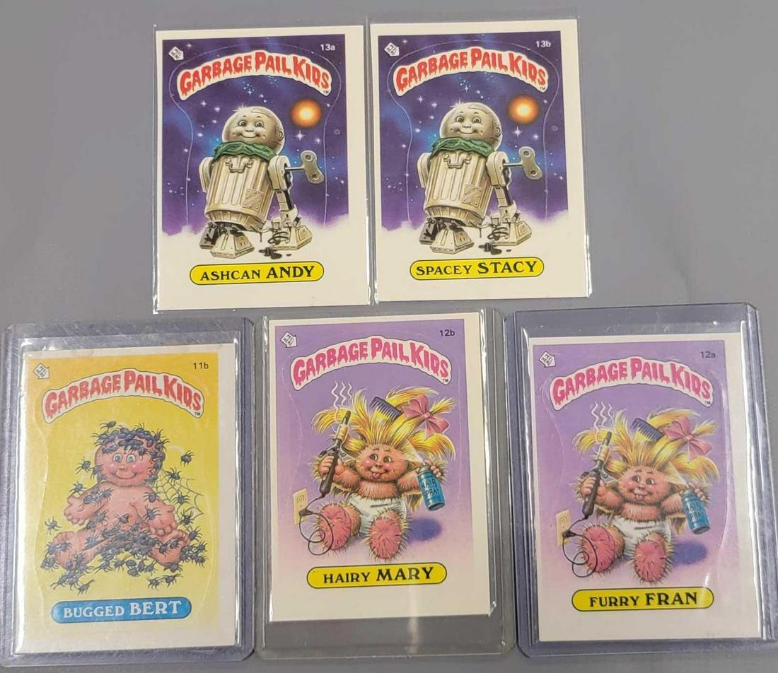 Five 1985 Topps Series 1 Garbage Pail Kids GPK cards: Five 1985 Series 1 Garbage Pail Kids GPK cards, includes 12a Furry Fran, 12b Hairy Mary, 13a Ashcan Andy, 13b Spacey Stacy and 11b Bugged Bert, all five are excellent with sharp corners all around exc