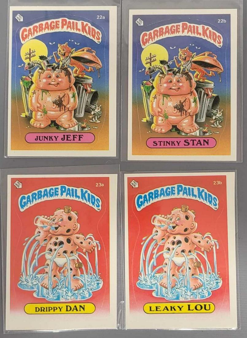 Four 1985 Topps Series 1 Garbage Pail Kids GPK cards: Four 1985 Series 1 Garbage Pail Kids GPK cards, includes 22a Junky Jeff, 22b Stinky Stan, 23a Drippy Dan and Leaky Lou, all four are excellent with sharp corners all around, all are off center right t