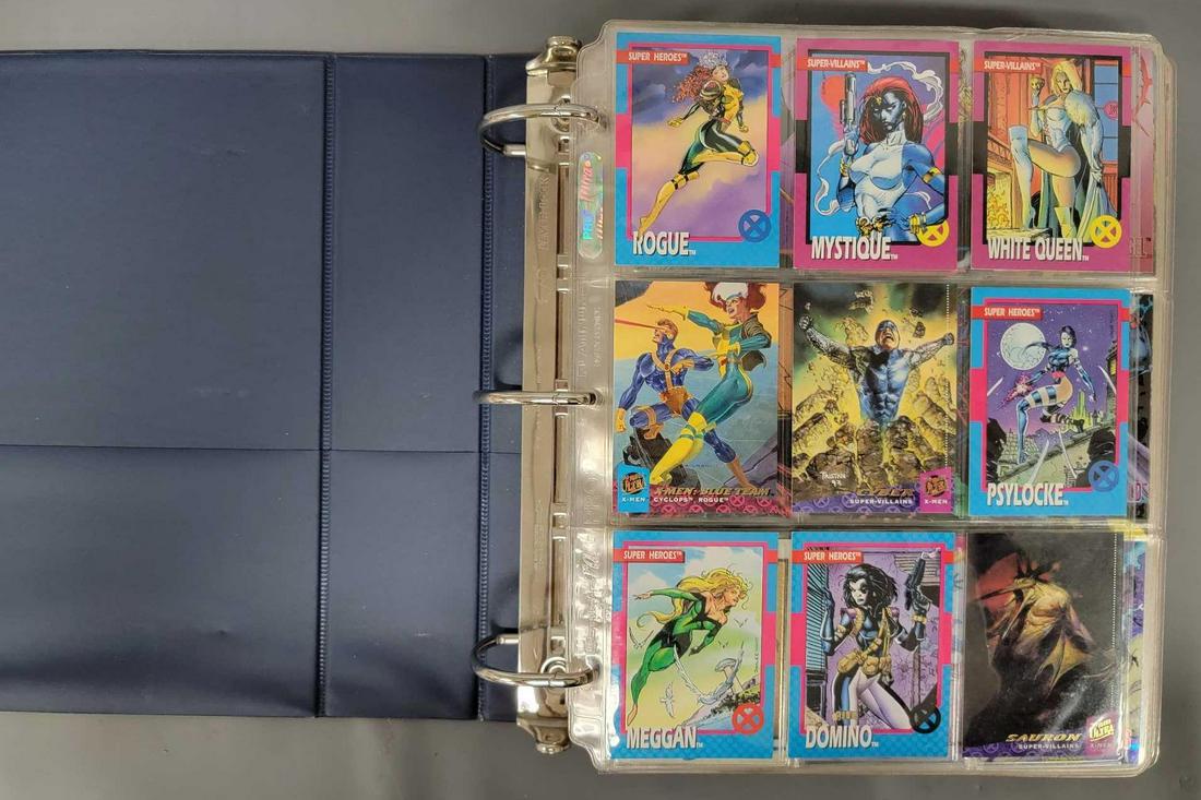 Large binder of early 1990's non sports trading cards: Large binder of early 1990's non sports trading cards, includes partial 1994 Wildstorm Chromium set, partial 1994 Fleer Ultra X-men set, partial Impel Marvel Super Heroes set, nine different holog
