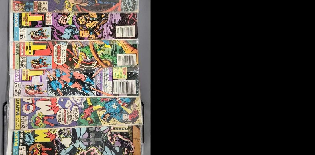 Eight assorted Marvel Thor and Captain Marvel comic books (1 of 3)