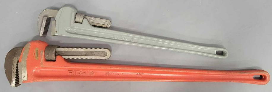 Two large pipe wrenches including a 48 inch Ridgid and a 36 inch made in China: Two large pipe wrenches including a 48 inch Ridgid and a 36 inch made in China, both are in excellent condition, lightly used if at all, they do have light storage wear.