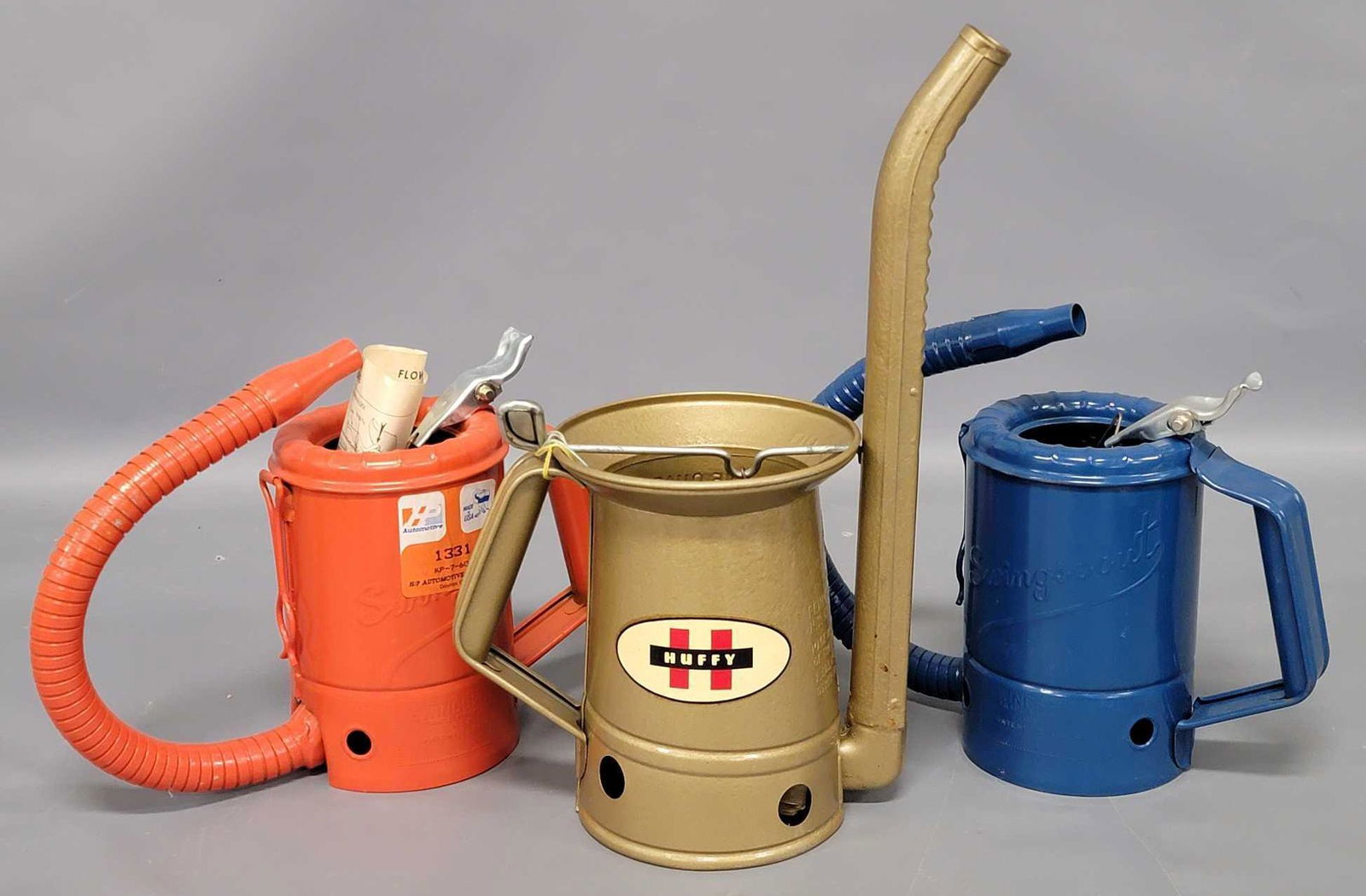 Three vintage flex spout oil cans including two Swingspout and one Huffy (1 of 7)
