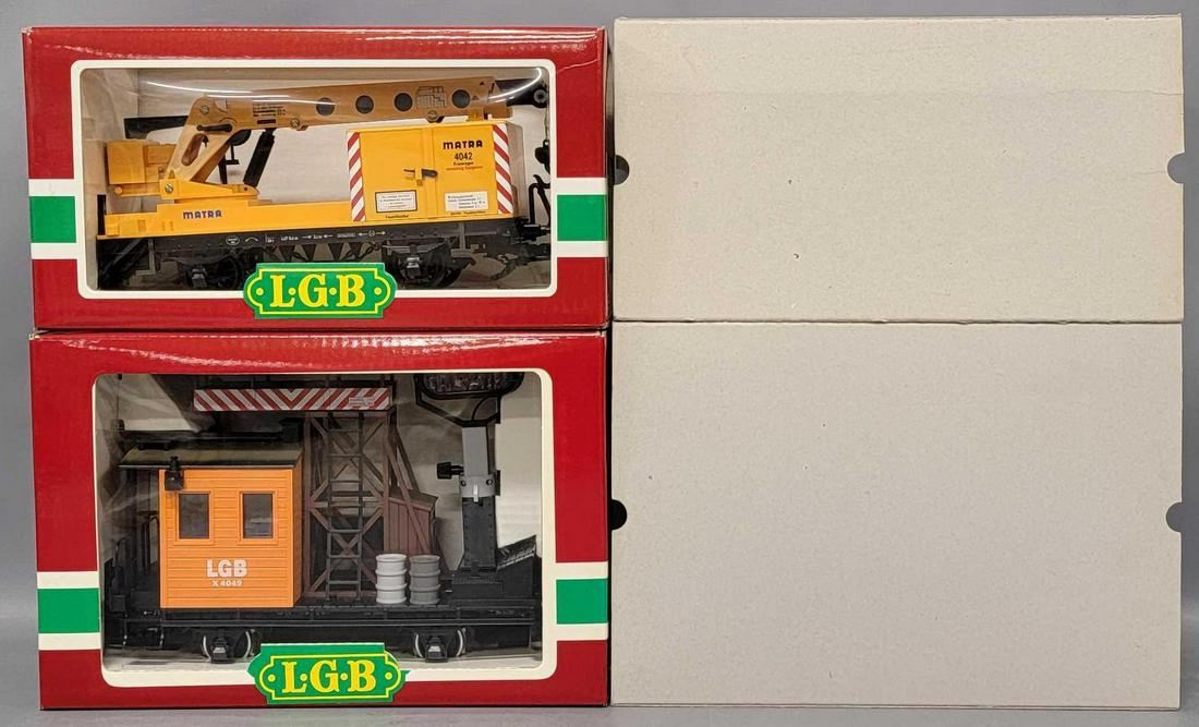 Two LGB G Gauge includes 4042 and 4049 work train cars in original boxes: Two LGB G Gauge 4042 and 4049 work train cars in original boxes, includes 4042 Matra Crane car and 4049 Searchlight box car, both are C7+ and appear unrun
