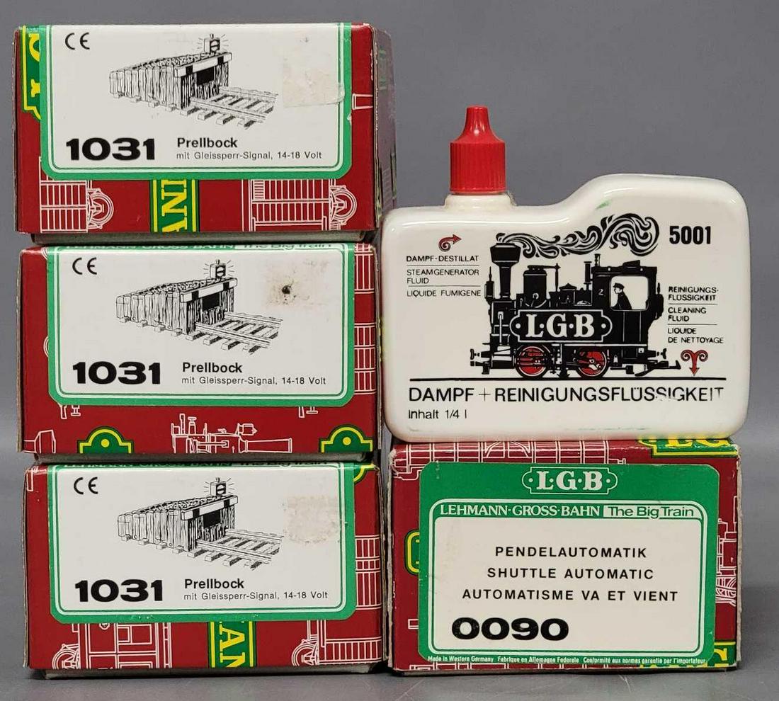 LGB G Gauge 0090 Shuttle Automatic Reverse Bumper and three 1031 lighted bumpers in original boxes: LGB G Gauge 0090 Shuttle Automatic Reverse Bumper and three 1031 lighted bumpers in original boxes, appears to be in excellent condition in an excellent original box, also including a partially full b