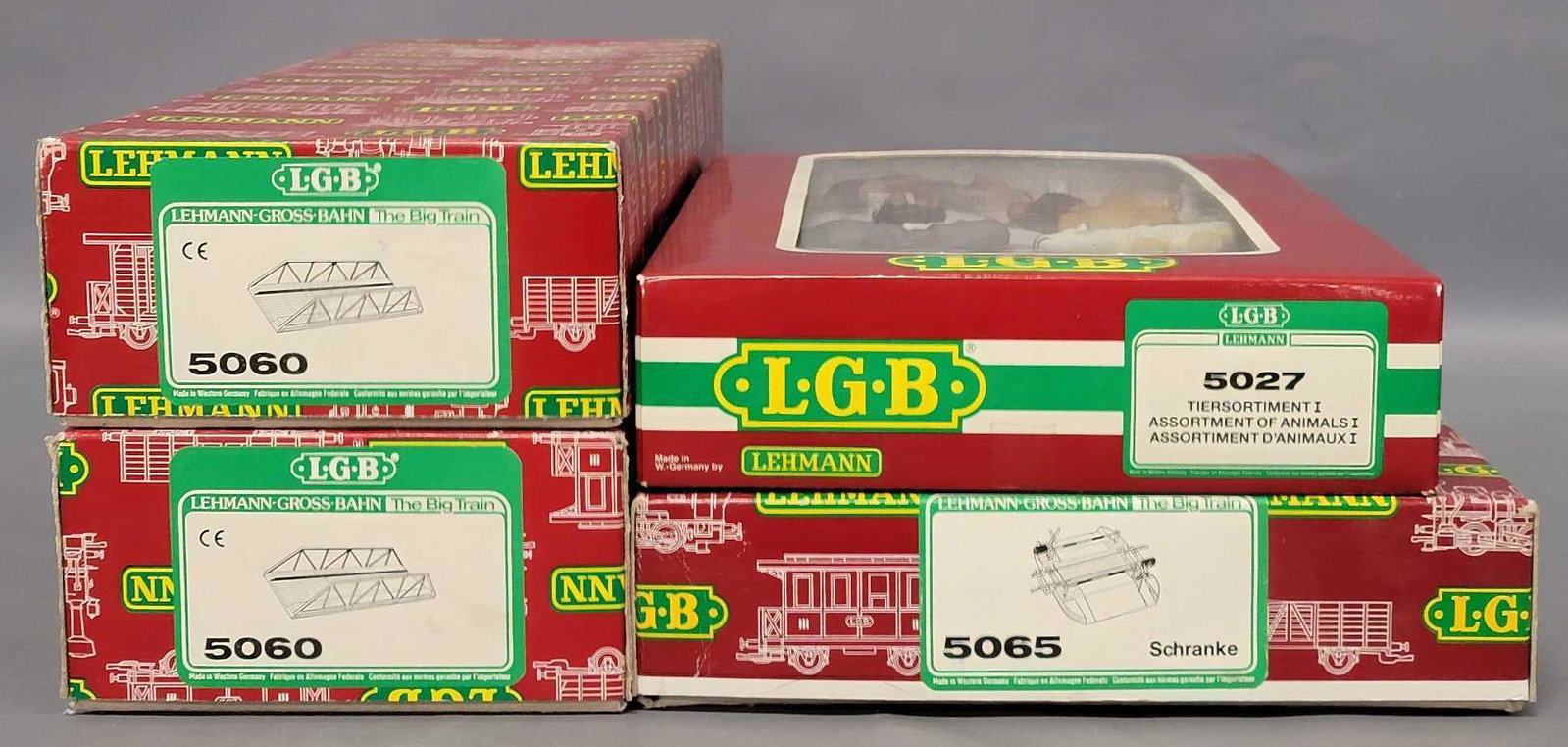 Four LGB G Gauge train track accessories in original boxes: Four LGB G Gauge train track accessories in original boxes, includes 5027 assortment of circus animals, all are excellent like new, two 5060 truss bridges, both are excellent with no issues in excelle