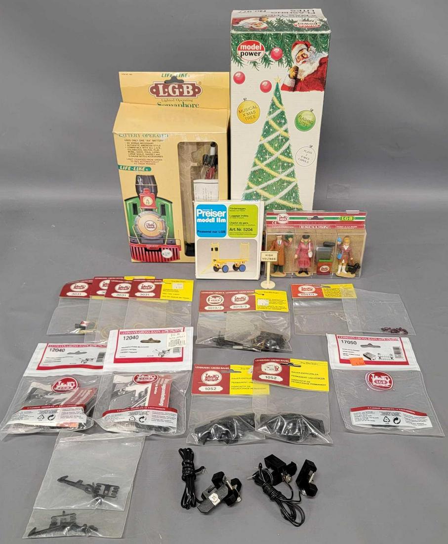 Large Collection of LGB G Gauge track accessories: Large Collection of LGB G Gauge track accessories, includes a Model Power Musical Xmas tree with flashing lites, a Life-Like lighted operating Semaphore, #5129 figure set (never opened), four 3031 red