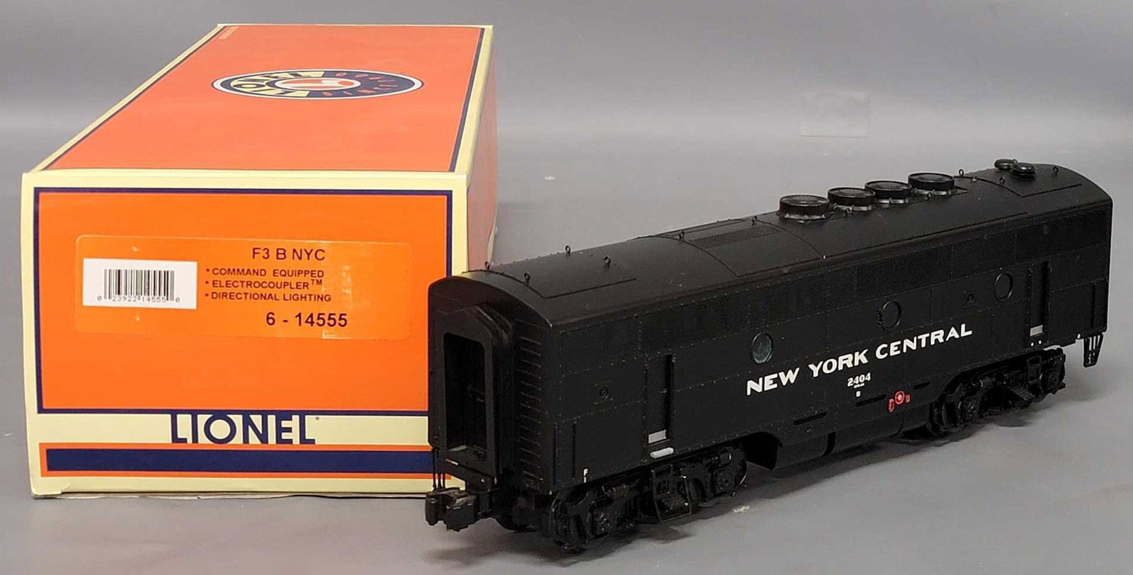Lionel O Gauge New York Central F3 B Unit locomotive in original box: Lionel O Gauge New York Central F3 B Unit locomotive in original box, #14555 appears C6-7 only because of a few light marks and one set of the brake lines at one corner is missing, comes in a very goo
