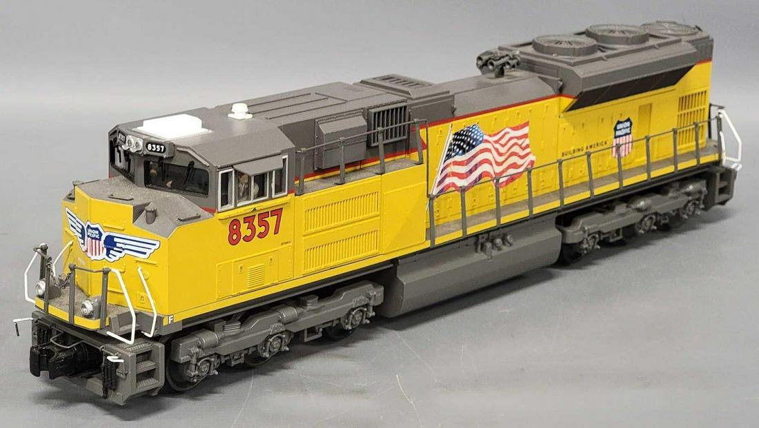 MTH RailKing O Gauge Union Pacific SD70ACE Diesel locomotive: MTH RailKing O Gauge Union Pacific SD70ACE Diesel locomotive, locomotive is very good to excellent C6-7with light run time, only issues of note are spots of light wear on side rails and same rails nee