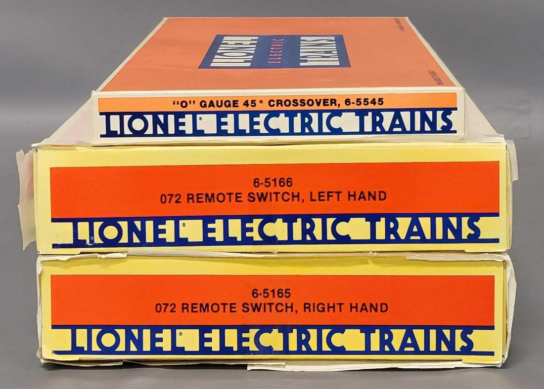 Three Lionel O Gauge Track pieces in original boxes: Three Lionel O Gauge Track pieces in original boxes, includes 5165 072 Remote Switch right hand, 5166 072 Remote Switch left hand and 5545 O gauge 45 degree crossover, the crossover may have been used