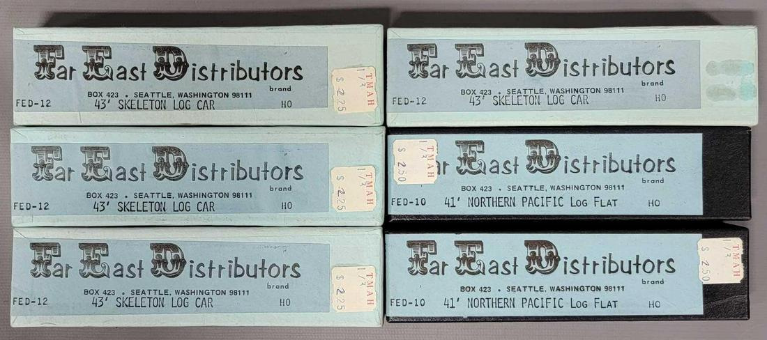 Six Far East Distributors HO brass Log Cars in original boxes: Six Far East Distributors HO brass Log Cars in original boxes, includes two 41 foot single car boxes and four 43 foot single car boxes, all are excellent C8-9 unbuilt in excellent original boxes.