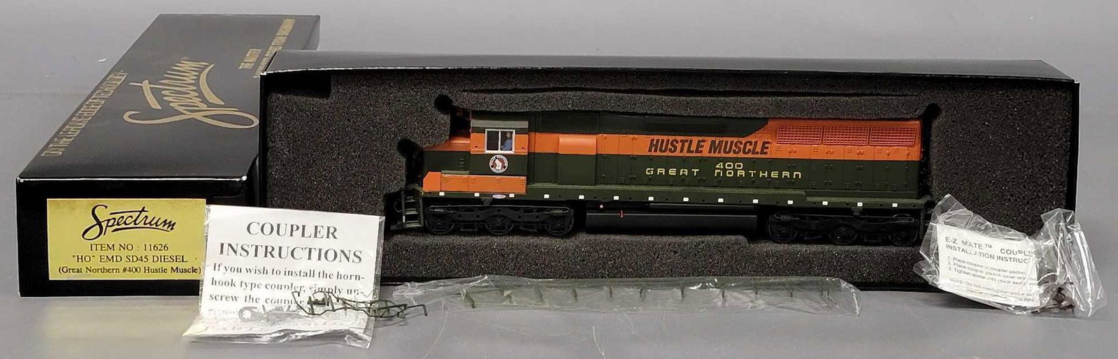 Bachmann Spectrum HO Great Northern EMD SD45 diesel locomotive in original box: Bachmann Spectrum HO Great Northern EMD SD45 diesel locomotive in original box, Hustle Muscle locomotive appears excellent to near mint with light run time if any, C7-8, detail parts are not attached 