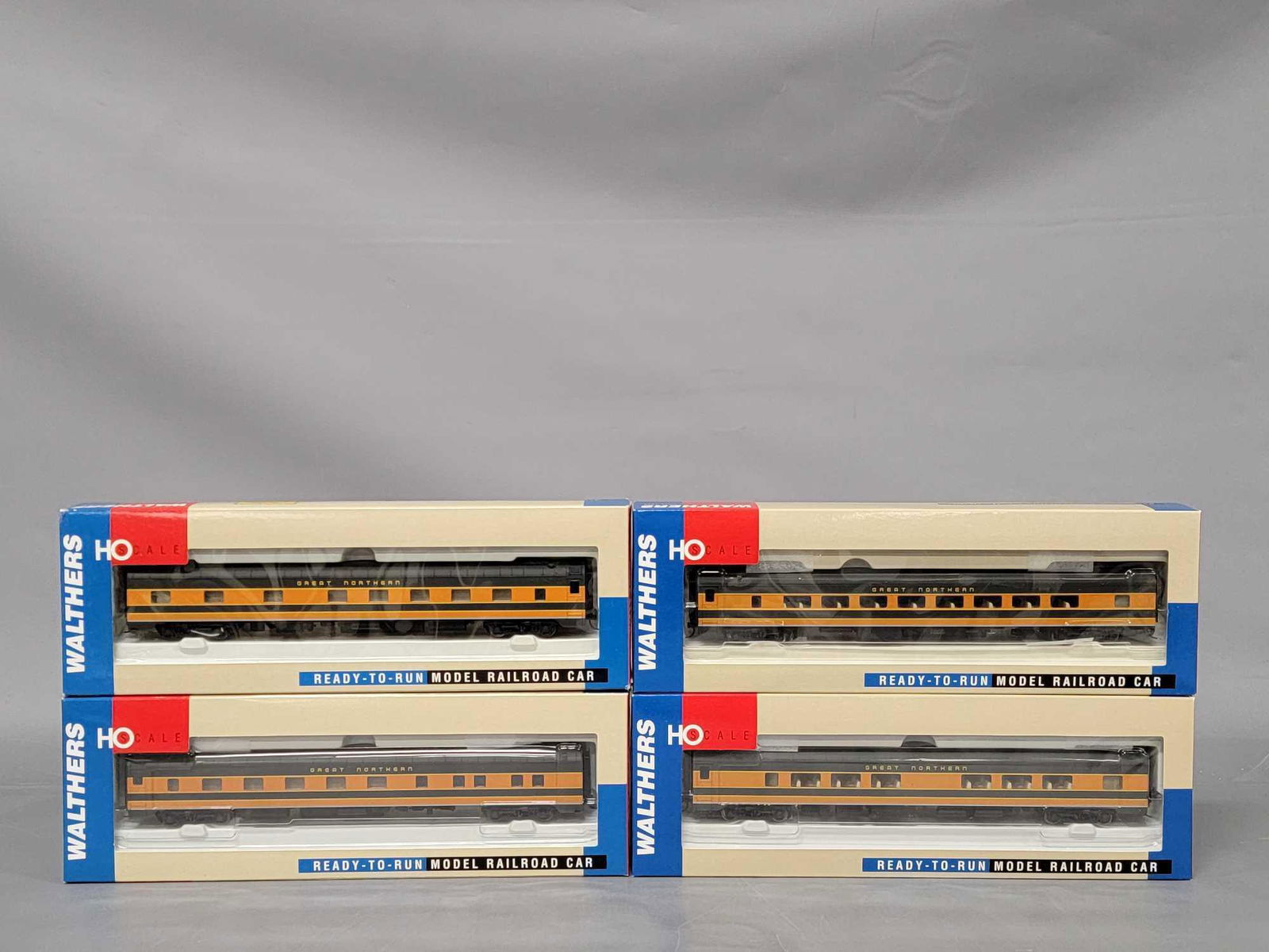 Four Walther RTR HO Great Northern passenger cars in original boxes: Four Walther RTR HO Great Northern passenger cars in original boxes, includes 6781 Pullman-Standard 64-seat Coach, 6761 Pullman-Standard 52-seat Coach, 6741 Pullman-Standard 10-5 Sleeper and 6701 Pull