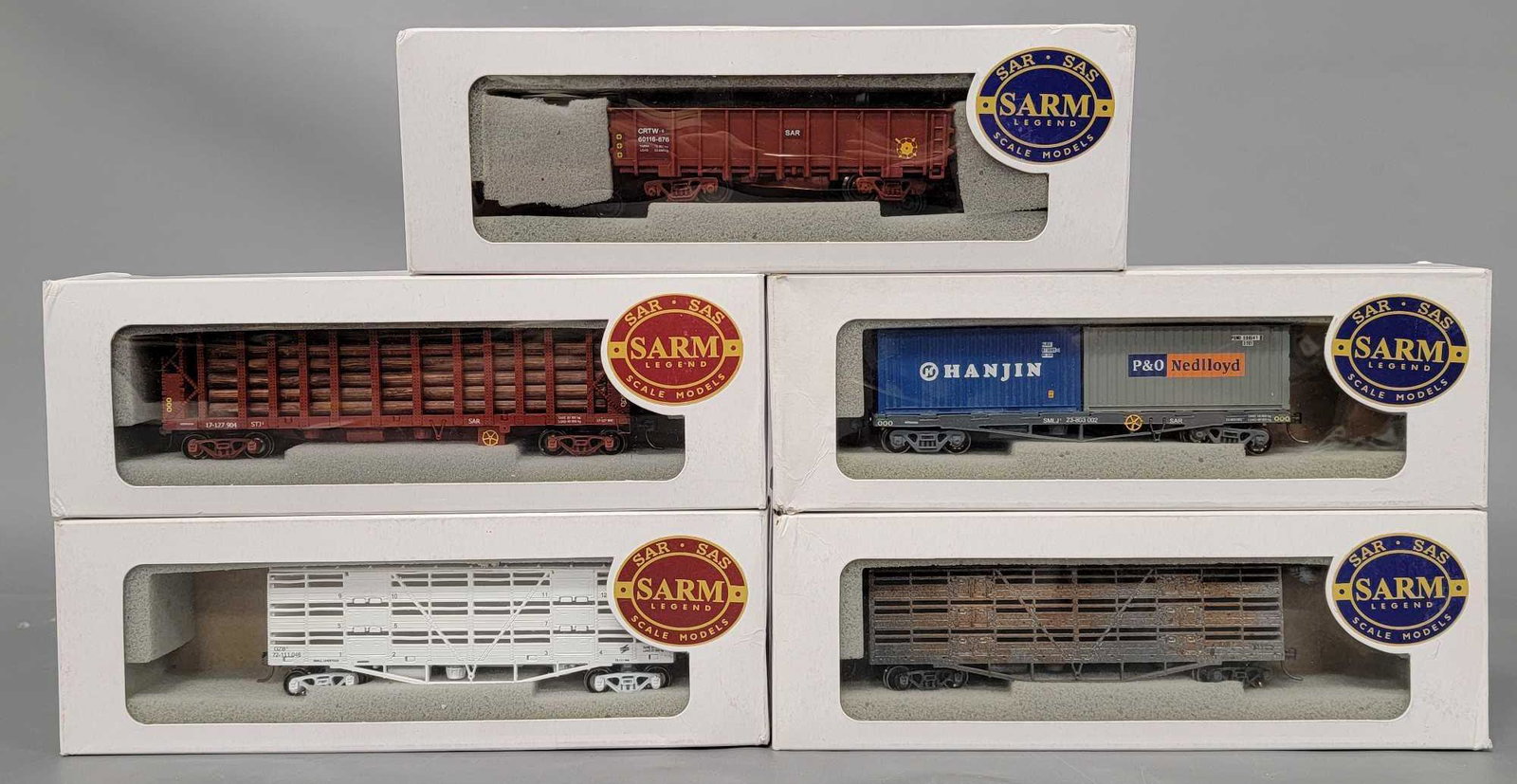 Five SAR SAS HO freight cars in original boxes: Five SAR SAS HO freight cars in original boxes, includes two with red labels including STJ-2 Timber Load wagon and GZB Small Livestock wagon and three blue labels including GZB Small livestock wagon, 