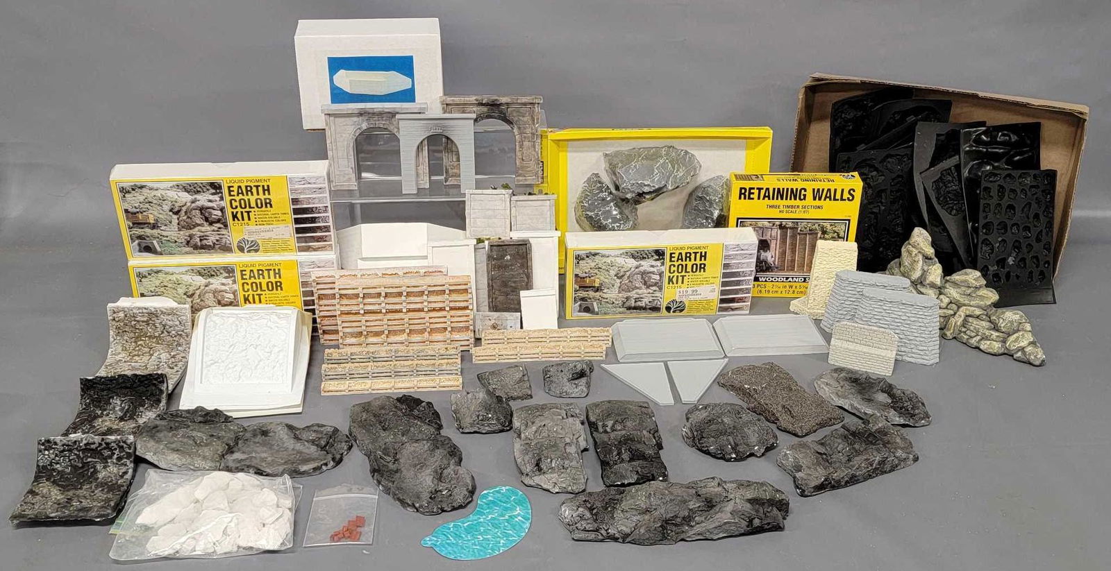 Large collection of Woodland Scenics and other brands of HO scale rocks and plaster bridge parts and (1 of 8)