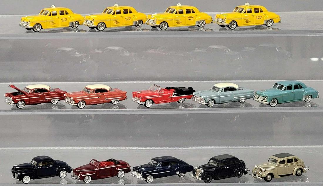 Fourteen CMW HO scale vehicles for layouts: Fourteen CMW HO scale vehicles for layouts, includes four yellow cabs, two 50s convertibles and eight coupes and sedans, all are very good to excellent, these came from a large HO train layout.