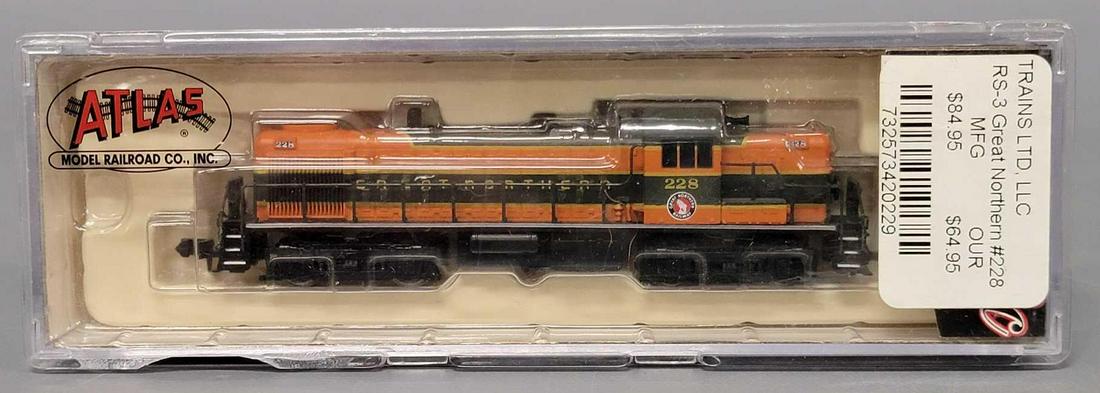 Atlas N scale Great Northern RS-3 diesel locomotive in original box: Atlas N scale Great Northern RS-3 diesel locomotive in original box, #42022 locomotive appears excellent lightly run if at all C7-8 in excellent original box.