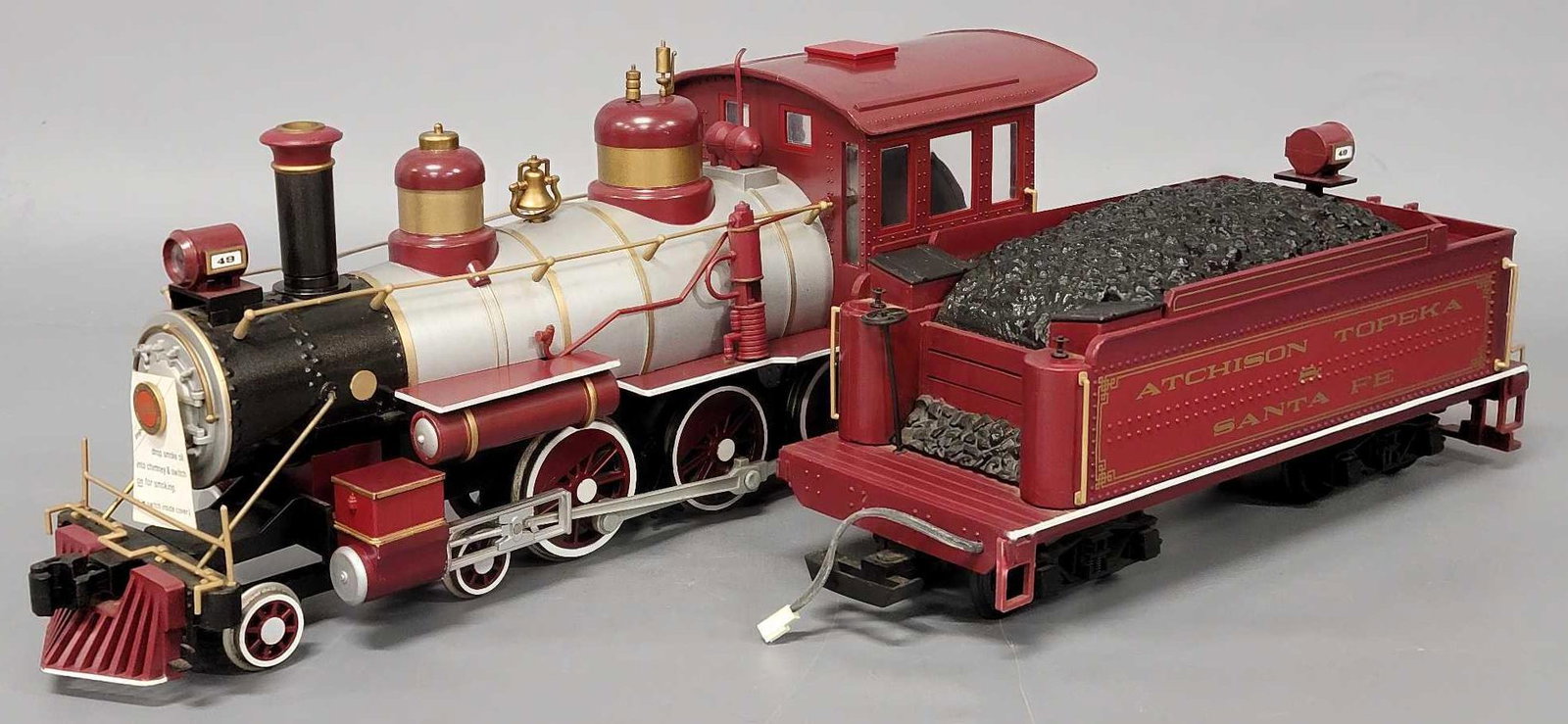 Bachmann Big Hauler G Scale AT & SF #49 4-6-0 Baldwin Steam Locomotive & Tender: Bachmann Big Hauler G Scale AT & SF #49 4-6-0 Baldwin Steam Locomotive & Tender, appears very good to excellent C5-6 as it may have minor repairs or missing minor detail parts.