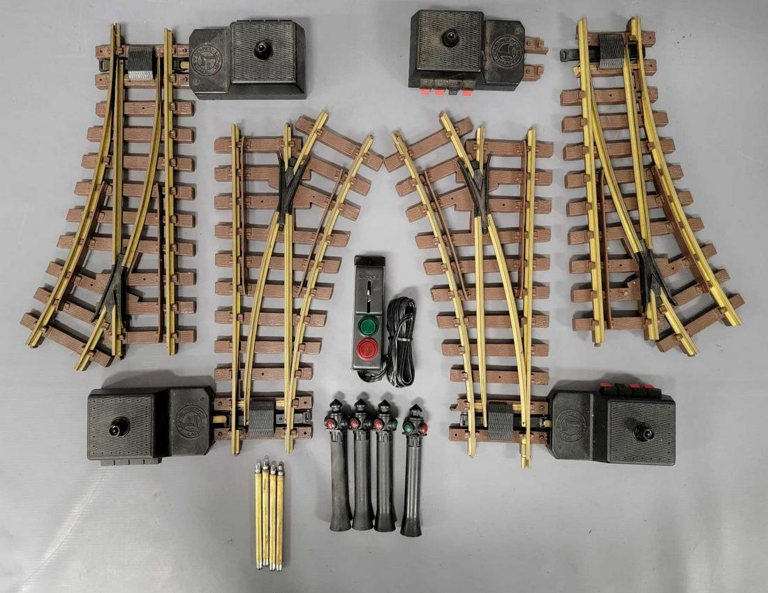 Four Lionel Large G Scale brass switch track pieces used: Four Lionel Large G Scale brass switch track pieces used, includes two right and two left though one of the right switches needs repair as the control has broken off, these do include their signal pos