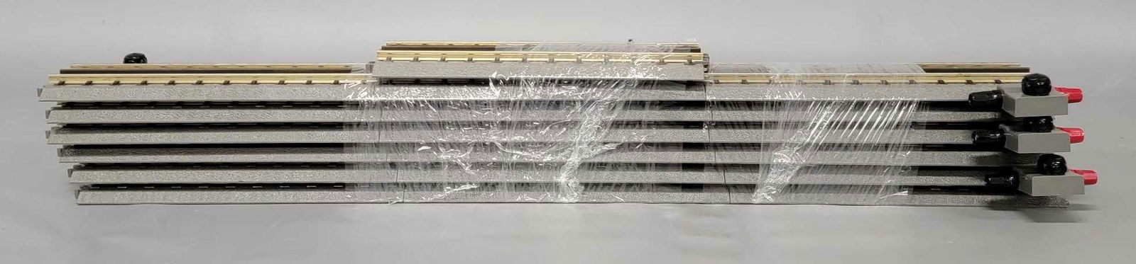 Six MTH Realtrax O scale 30 inch straight track pieces with lock ons (1 of 2)