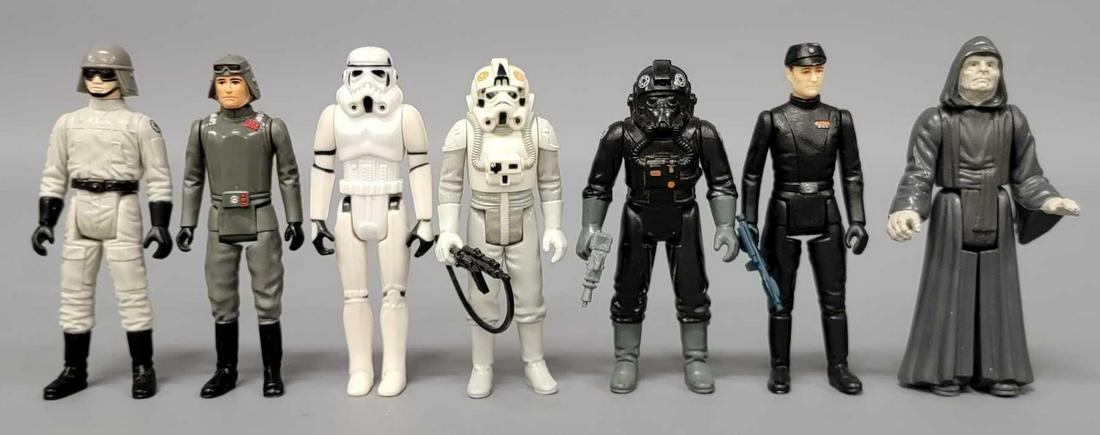 Seven Empire Strikes Back action figures: Seven Empire Strikes Back figures, includes Emperor Palpatine (missing staff), Imperial AT-AT Commander with weapon, Imperial Commander with weapon, At-At driver, AT-ST driver, Tie Fighter Pilot with 