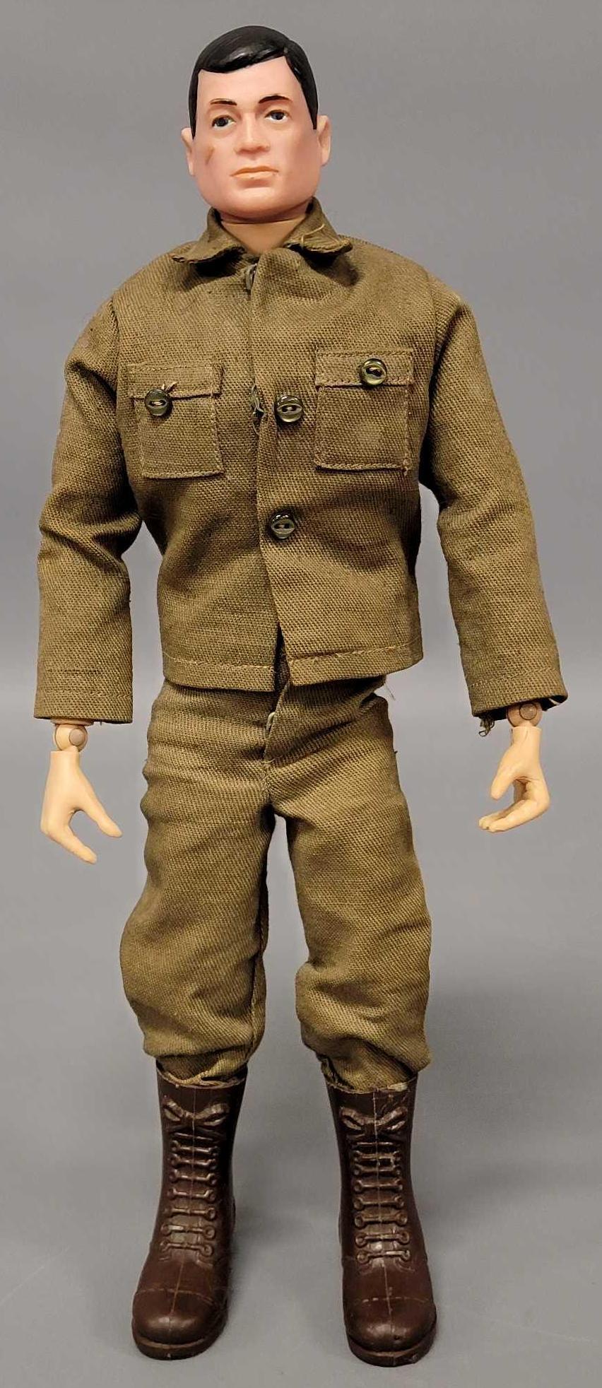 Hasbro 1964 GI Joe 12 inch action figure: Hasbro 1964 GI Joe 12 inch action figure, figure is vey nice, brown hair with no wear, blue eyes, minor crack in right thigh at knee, left thigh has split at knee and calf on back side, comes with arm