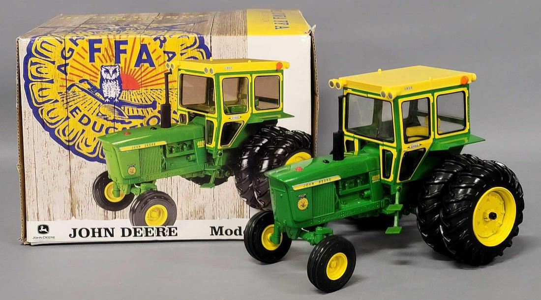 RC2 John Deere 1/16 scale Model 4020 2004 Iowa FFA Special Edition in original box: RC2 John Deere Model 4020 2004 Iowa FFA Special Edition 1/16 scale in original box #16123A, tractor appears near mint, comes in a very good original box.