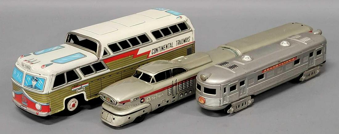 Three Japan tin litho friction vehicles (1 of 7)