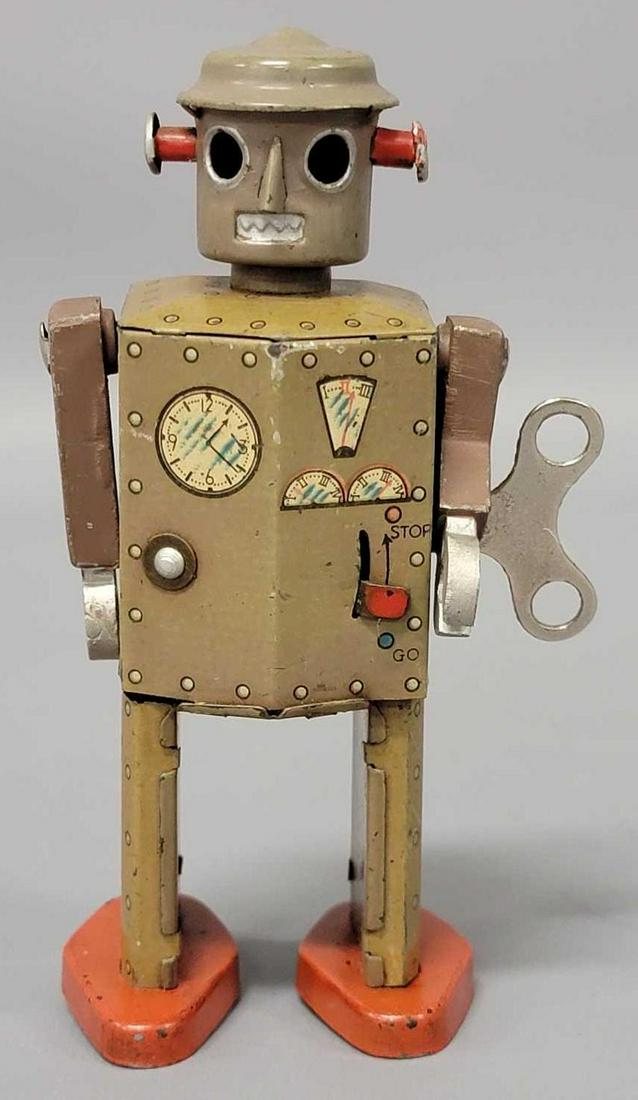 Very rare Atomic Man wind-up tin toy (1 of 7)