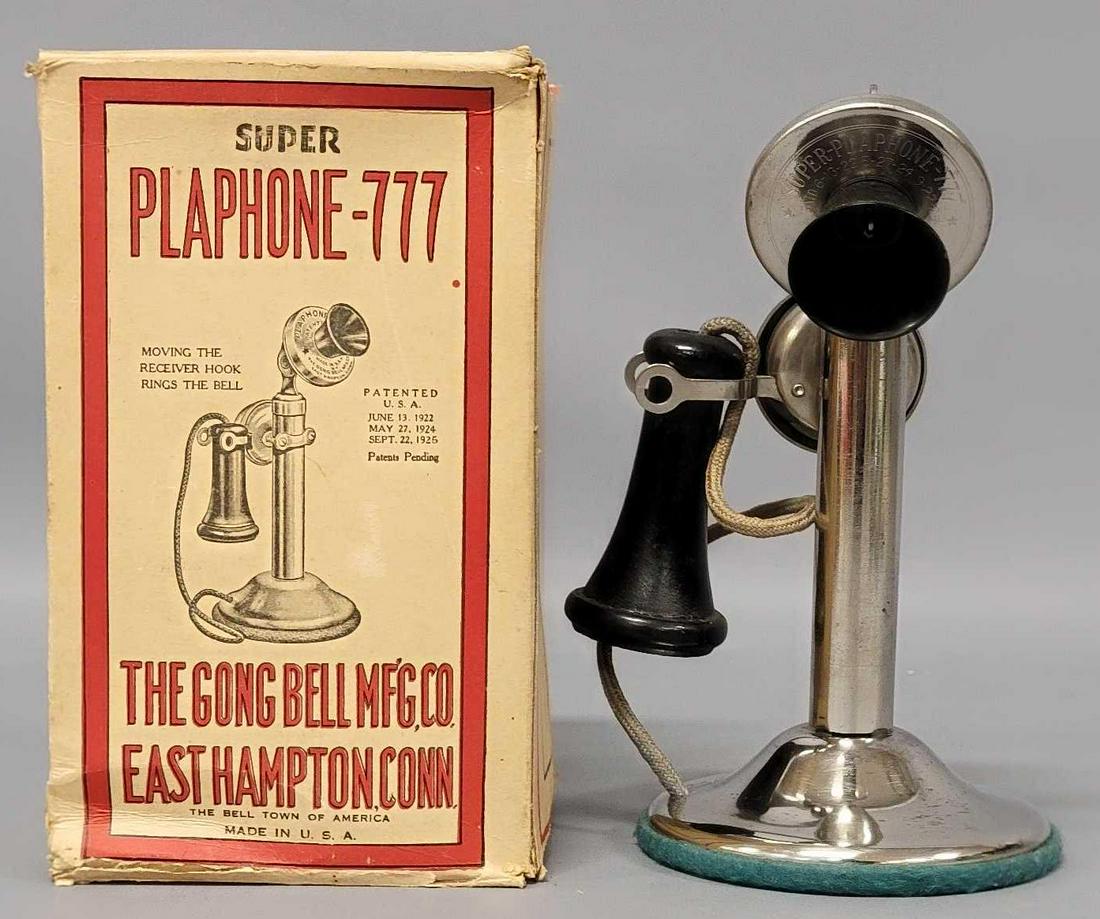 Gong Bell Mfg Super Plaphone-777 in rare original box: Gong Bell Mfg Super Plaphone-777 in rare original box, toy is very good but has light surface rust in spots, the box is ultra rare, and in very good condition, there are some rips in the end flap seem