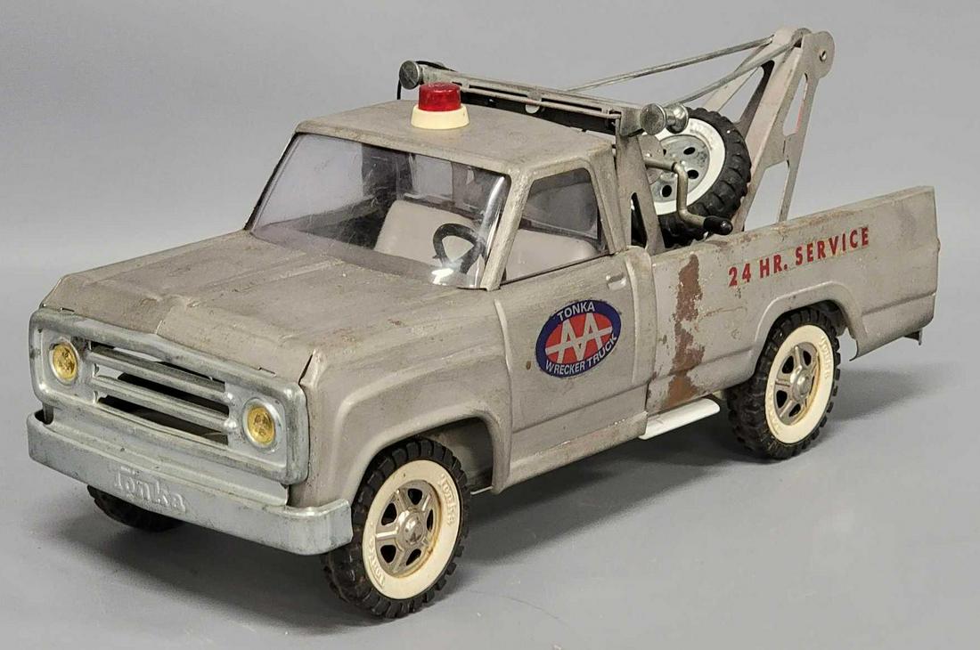 Tonka pressed steel 24 hour service wrecker truck for parts or repair: Tonka pressed steel 24 hour wrecker truck for parts or repair, truck is good structurally, it was stripped of its body paint at some point and possibly primered and decals applied on over that, so may