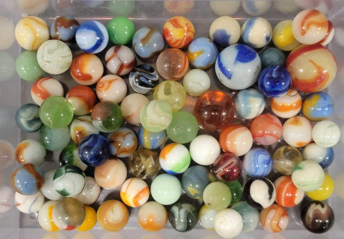 Collection of eighty-one vintage Black light marbles (1 of 4)