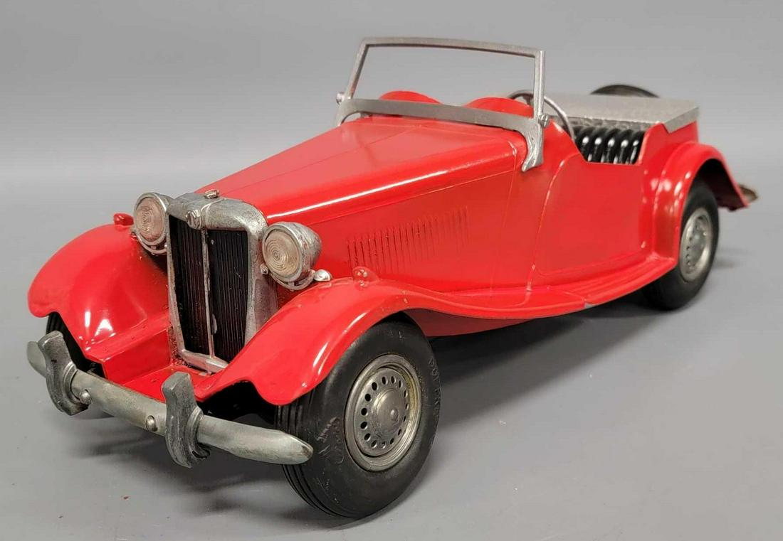 Restored Doepke diecast MG TD Convertible: Restored Doepke diecast MG TD Convertible, Doepke Model Toy Mfg. Rossmoyne, Ohio this is a poorly restored example of this 1952 TD, it is 16 inches long, 6 inches wide and 5 inches high, perfect candi